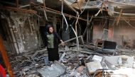 Raghad Hammoudi, who is a member of a group of students campaigning to help rebuild the Central Library of Mosul University, speaks with Reuters, in Mosul, Iraq May 14, 2018. Picture taken May 14, 2018. REUTERS/Khalid Al-Mousily