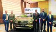 Officials with the new Rush during the launching ceremony. 