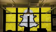 An image of the Snapchat logo created with Post-it notes is seen in the windows of Havas Worldwide at 200 Hudson Street in lower Manhattan, New York, US, May 18, 2016. REUTERS/Mike Segar