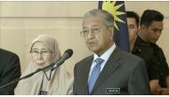 Malaysia's Prime Minister Mahathir Mohamad speaks beside Deputy Prime Minister Wan Azizah Wan Ismail during a news conference after a weekly cabinet meeting in Putrajaya, Malaysia in a still image taken from a Reuters TV footage on May 30, 2018. REUTERS/R