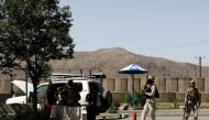 Afghan security forces inspect them at the gate of an Interior ministry after an attack in Kabul, Afghanistan May 30, 2018. REUTERS/Mohammad Ismail