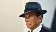 (FILES) In this file photo taken on May 19, 2016, Japan's Finance Minister Taro Aso arrives at a welcome reception hosted by the City of Sendai in Sendai. AFP / Kazuhiro NOGI