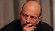 The newly appointed Jordanian Prime Minister Omar al-Razzaz (C) meets with member of Union leaders in Amman, on June 7, 2018.   AFP / Ahmad GHARABLI

