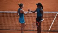 Romania's Simona Halep (L) shakes hands as she celebrates after victory over Sloane Stephens of the US (R) during their women's singles final match on day fourteen of The Roland Garros 2018 French Open tennis tournament in Paris on June 9, 2018. / AFP / E