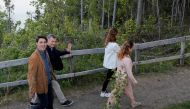 Canada's Prime Minister Justin Trudeau and his wife Sophie Gregoire Trudeau walk with Argentina's President Mauricio Macri and his wife Juliana Awada Macri during a G7 Summit in the Charlevoix town of La Malbaie, Quebec, Canada, June 9, 2018. REUTERS/Yves