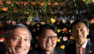 Singapore's Finance Minister Vivian Balakrishnan, North Korean leader Kim Jong Un, and Singapore's Education Minister Ong Ye Kung pose for a photo in Singapore June 11, 2018, in this photo obtained from social media. (Vivian Balakrishnan's Twitter page/vi