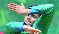 Afghanistan spinner Mujeeb-Ur-Rahman bowls in the nets during a practice session at the M. Chinnaswamy Stadium in Bangalore on June 12, 2018. AFP / Manjunath Kiran