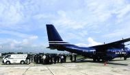 A person sereverly burnt during the Fuego volcano eruption is carried onto a plane of the Mexican Federal Police before departing for Mexico to receive specialized treatment, at the Guatemalan Air Force (FAG) base in Guatemala City on June 12, 2018. More 