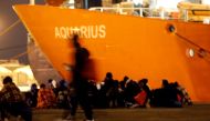 Migrants disembark from the MV Aquarius a search and rescue ship run in partnership between SOS Mediterranee and Medecins Sans Frontieres on the island of Sicily January 30 2018 Reuters Antonio Parrinello