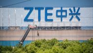 This file photo taken on May 3, 2018 shows the ZTE logo on a building in Shanghai.  AFP / Johannes Eisele