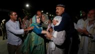Relatives of Syed Shujaat Bukhari, the editor of Rising Kashmir daily newspaper, mourn after Bukhari was killed by unidentified gunmen outside his office in Srinagar, June 14, 2018. Reuters/Danish Ismail