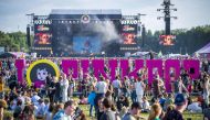 Festival goers gather during the first day of the music festival Pinkpop, at Landgraaf on June 15, 2018. Netherlands OUT / AFP / ANP / Marcel van Hoorn