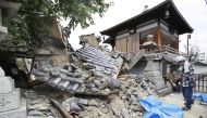 Damaged Myotoku-ji temple caused by an earthquake is seen in Ibaraki, Osaka prefecture, western Japan, in this photo taken by Kyodo June 18, 2018. Kyodo/via REUTERS
