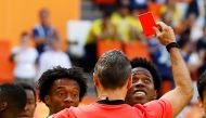Colombia's Carlos Sanchez is sent off by referee Damir Skomina REUTERS/Jason Cairnduff
