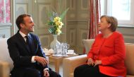German Chancellor Angela Merkel and French President Emmanuel Macron hold bilateral talks on June 19, 2018, at the Meseberg Palace, north of Berlin, during a ministerial conference to coordinate European reform proposals ahead of EU summit on June 28-29, 