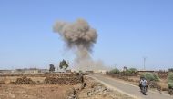 Smoke rises after Assad Regime forces carried out an attack in Syria's southwestern Daraa province on June 23, 2018. Ammar Al Ali - Anadolu

