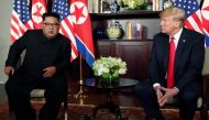 FILE PHOTO: U.S. President Donald Trump and North Korea's leader Kim Jong Un meet in a one-on-one bilateral session at the start of their summit at the Capella Hotel on the resort island of Sentosa, Singapore June 12, 2018. REUTERS/Jonathan Ernst