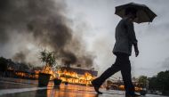 Myanmar law enforcement authorities burn seized illegal drugs worth 187 million USD, marking the International Day against Drug Abuse and Illicit Trafficking during a ceremony in Yangon on June 26, 2018. AFP / Ye Aung THU