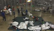 In this file US Customs and Border Protection photo dated June 17, 2018 and obtained June 18, 2018 shows intake of illegal border crossers by US Border Patrol agents at the Central Processing Center in McAllen, Texas. AFP PHOTO / US CUSTOMS AND BORDER PRO