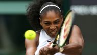 (FILES) In this file photo taken on July 09, 2016 US player Serena Williams returns against Germany's Angelique Kerber during the women's singles final on the thirteenth day of the 2016 Wimbledon Championships at The All England Lawn Tennis Club in Wimble