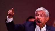 Newly elected Mexico's President Andres Manuel Lopez Obrador (C), running for 