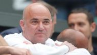 File photo of Serbia’s Novak Djokovic's coach Andre Agassi before the fourth round match against France’s Adrian Mannarino, July 11, 2017. REUTERS/Matthew Childs