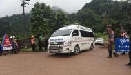 Ambulance head to Tham Luang cave area as divers began evacuation of the 12 boys and their coach trapped at the cave in Khun Nam Nang Non Forest Park in the Mae Sai district of Chiang Rai province on July 8, 2018. (AFP / Lillian SUWANRUMPHA)
