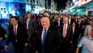 U.S. Secretary of State Mike Pompeo, walks through the streets of Hanoi, Vietnam July 8, 2018. Andrew Harnik/Pool via Reuters