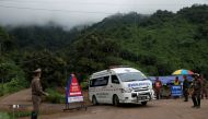 An ambulance is seen Tham Luang cave complex, where scoolboys are trapped in a flooded cave, in the northern province of Chiang Rai, Thailand, July 9, 2018. REUTERS/Soe Zeya Tun