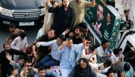Muhammad Safdar, son-in-law of ousted Prime Minister Nawaz Sharif, waves to supporters while leading a rally before his arrest in Rawalpindi, Pakistan July 8, 2018. Reuters/Faisal Mahmood