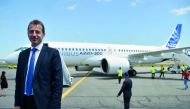 Guillaume Faury, President of the Airbus Commercial Aircraft poses in front of the new Airbus A220-300 during its presentation on July 10, 2018 at the Airbus delivery center, in Colomiers, southwestern France.  AFP / Pascal Pavani