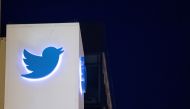 In this file photo taken on November 4, 2016 the Twitter logo is seen on a sign at the company's headquarters in San Francisco, California.  AFP / Josh Edelson

