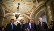 Senate Majority Leader Mitch McConnell (R-KY) speaks with fellow Senate Republicans during a news conference following the weekly Senate Republicans policy luncheon, on Capitol Hill, on July 10, 2018 in Washington, DC. Al Drago/Getty Images/AFP
