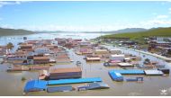 A flooded village is seen Zoige County, Sichuan, China July 13, 2018, in this still image taken from a video obtained from social media on July 14, 2018. TONGZHOU SONG/via REUTERS 