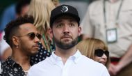 Husband of US player Serena Williams, Alexis Ohanian, takes his seat on court to watch her play against Germany's Angelique Kerber in their women's final match on the twelfth day of the 2018 Wimbledon Championships at The All England Lawn Tennis Club in W