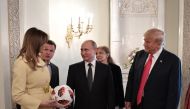 Russia's President Vladimir Putin (C), U.S. President Donald Trump (R) and First lady Melania Trump speak during a meeting in Helsinki, Finland July 16, 2018. Sputnik/Alexei Nikolsky/Kremlin