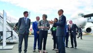 Britain's Prime Minister Theresa May (C) is accompanied by Airbus CEO Tom Enders (R) on her arrival at the Farnborough Airshow, south west of London, on July 16, 2018. AFP / Ben Stansall