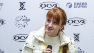 Mariia Butina, leader of a pro-gun organization, speaks on October 8, 2013 during a press conference in Moscow. (AFP)