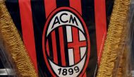 The AC Milan logo is pictured on a pennant in a soccer store in downtown Milan, Italy April 29, 2015. REUTERS/Stefano Rellandini
