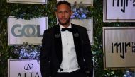 Brazilian PSG's footballer Neymar Junior, arrives to participate in the charity auction of the Neymar Jr. Institute in Sao Paulo, Brazil on July 19, 2018. (AFP / NELSON ALMEIDA)