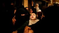 Relatives of Palestinian militant Mohammed Abu Dakah, 31, who was killed in an Israeli strike, mourn during his funeral in Khan Younis in the southern Gaza Strip July 21, 2018. Reuters/Suhaib Salem 