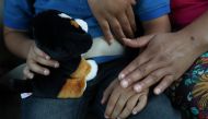 Dunia, an asylum seeker from Honduras, is reunited with her five-year-old son Wilman at Brownsville South Padre International Airport in Brownsville, Texas, U.S., following their separation of more than five weeks through the Trump administration's 