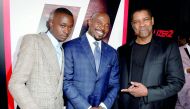 Actor Ashton Sanders, director Antoine Fuqua and actor Denzel Washington arrive at the premiere of Columbia Picture's 