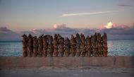 Newly made sandbags sit on a wall on a causeway that connects the town of Bairiki and Betio on South Tarawa in the central Pacific island nation of Kiribati, May 25, 2013. Reuters/David Gray