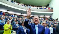 Turkish President Tayyip Erdogan greets parliamentarians from his ruling AK Party (AKP) during a meeting at the parliament in Ankara, Turkey July 24, 2018. Kayhan Ozer/Presidential Palace/Handout via Reuters