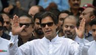 Pakistan's cricketer-turned politician Imran Khan of the Pakistan Tehreek-e-Insaf (Movement for Justice) speaks to the media. (AFP / AAMIR QURESHI)