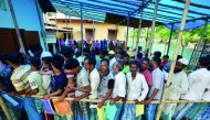 People wait in queue to check their names on the draft list at the National Register of Citizens (NRC) centre at a village in Nagaon district, Assam state, India, July 30, 2018. Reuters