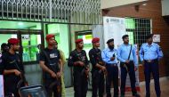 Pakistani police commandos and policemen stand guard at the entrance of the cardiac centre at the Pakistan Institute of Medical Sciences in Islamabad.  AFP / Farooq Naeem