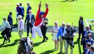 Regal Reality’s jockey  L Dettory celebrates after winning the Bonhams Thoroughbred Stakes (G3) yesterday.