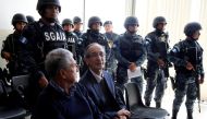 File photo of former Guatemalan President Alvaro Colom looks on during a court hearing after being detained as part of a local corruption investigation, in Guatemala City, Guatemala February 13, 2018. REUTERS/Luis Echeverria.